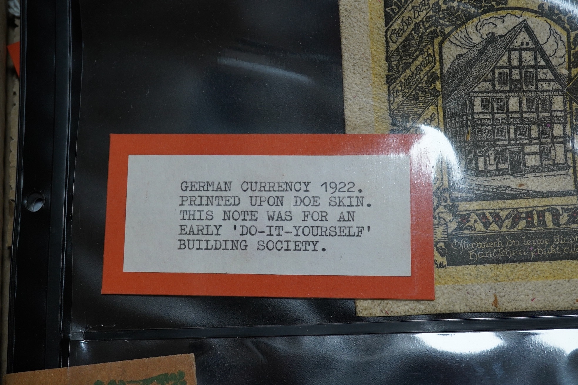 A collection of assorted world issue paper money including 1922 German doeskin, 1937 USSR Lenin, Malta P.11 1939, Zimbabwe, French Revolution British Government Forgery, 1878 Bank of Madras and Japanese.